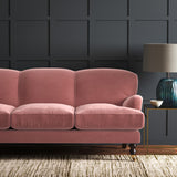 Pink eco velvet upholstery fabric on a sofa