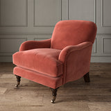 Orange eco velvet upholstery fabric on an armchair