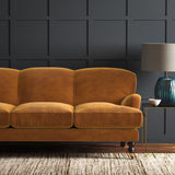 Yellow eco velvet upholstery fabric on a sofa