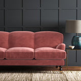 Pink eco velvet upholstery fabric on a sofa