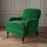 Green eco velvet upholstery fabric on an armchair