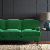 Green eco velvet upholstery fabric on a sofa