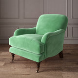 Green eco velvet upholstery fabric on an armchair