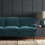 Blue eco velvet upholstery fabric on a sofa