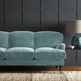 Blue eco velvet upholstery fabric on a sofa