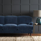 Blue eco velvet upholstery fabric on a sofa