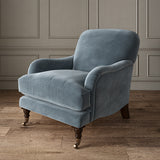Blue eco velvet upholstery fabric on an armchair