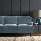 Blue eco velvet upholstery fabric on a sofa