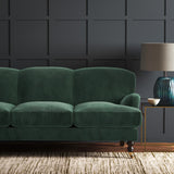 Green eco velvet upholstery fabric on a sofa