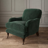 Green eco velvet upholstery fabric on an armchair