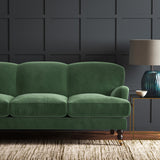 Green eco velvet upholstery fabric on a sofa