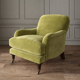 Green eco velvet upholstery fabric on an armchair