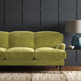 Green eco velvet upholstery fabric on a sofa