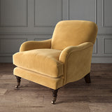 Gold eco velvet upholstery fabric on an armchair