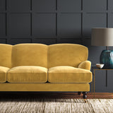 Gold eco velvet upholstery fabric on a sofa