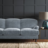 Grey eco velvet upholstery fabric on a sofa