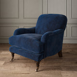 Blue eco velvet upholstery fabric on an armchair