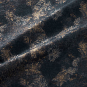 Fabric swatch of a luxurious dark blue velvet upholstery fabric with a metallic foil design 