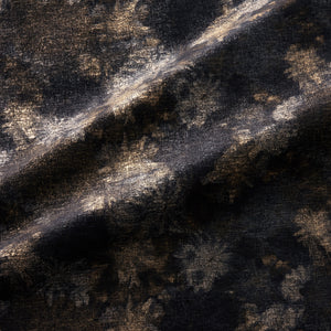 Fabric swatch of a luxurious black velvet upholstery fabric with a metallic foil design 