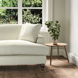 A cream, stain resistant woven fabric on an armchair.
