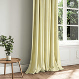 A cream woven fabric shown as a curtain.