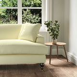 A cream, stain resistant woven fabric on an armchair.