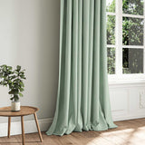A blue woven fabric shown as a curtain.