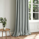 A blue woven fabric shown as a curtain.