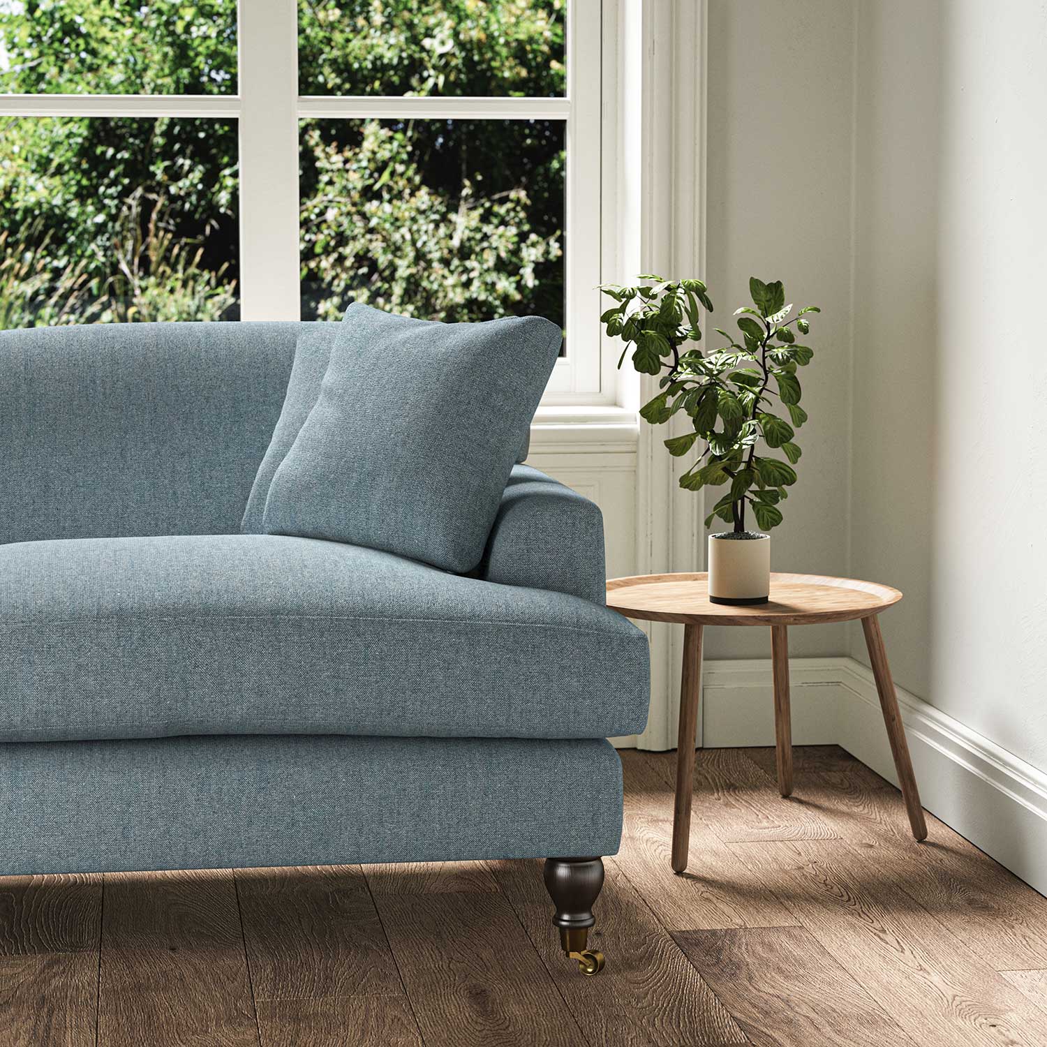 A blue stain resistant woven fabric on an armchair.