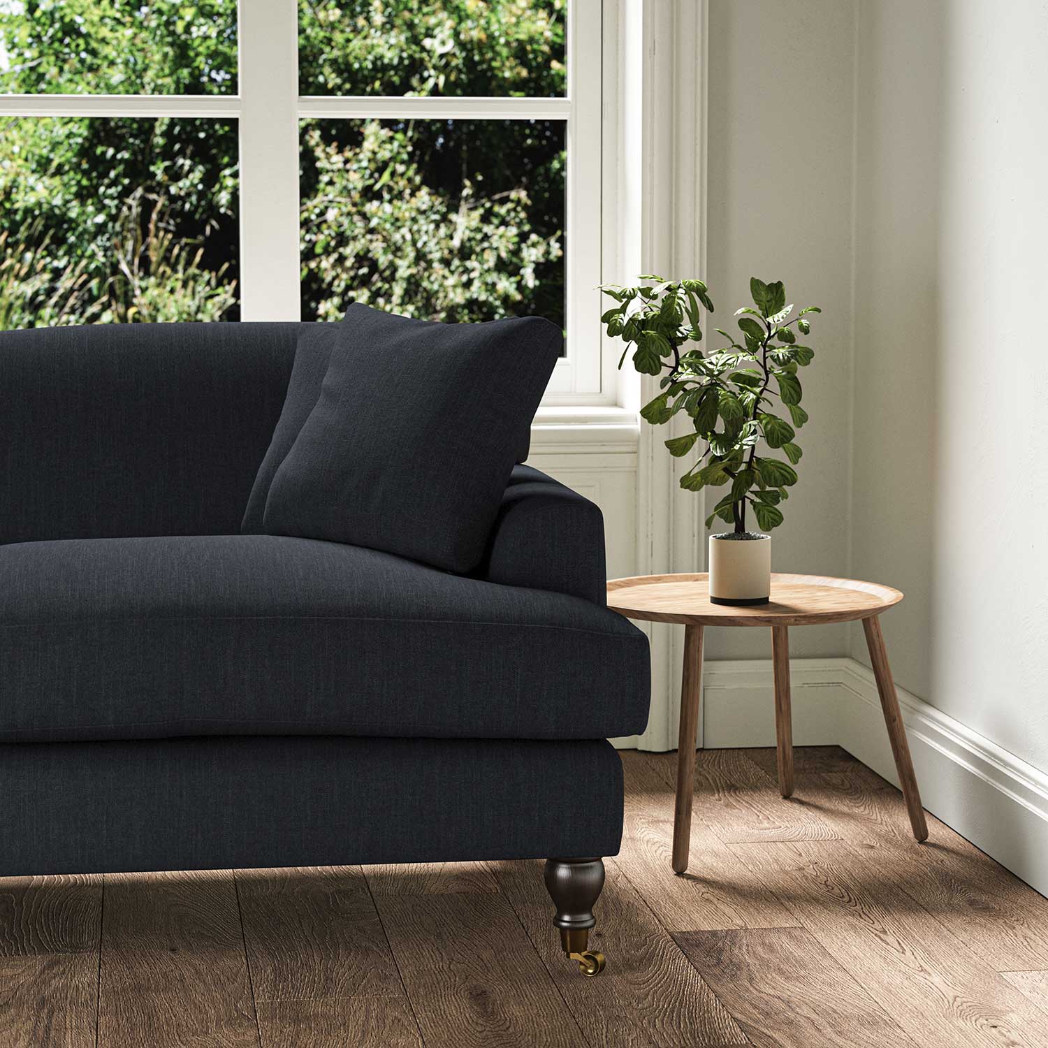 A navy stain resistant woven fabric on an armchair.