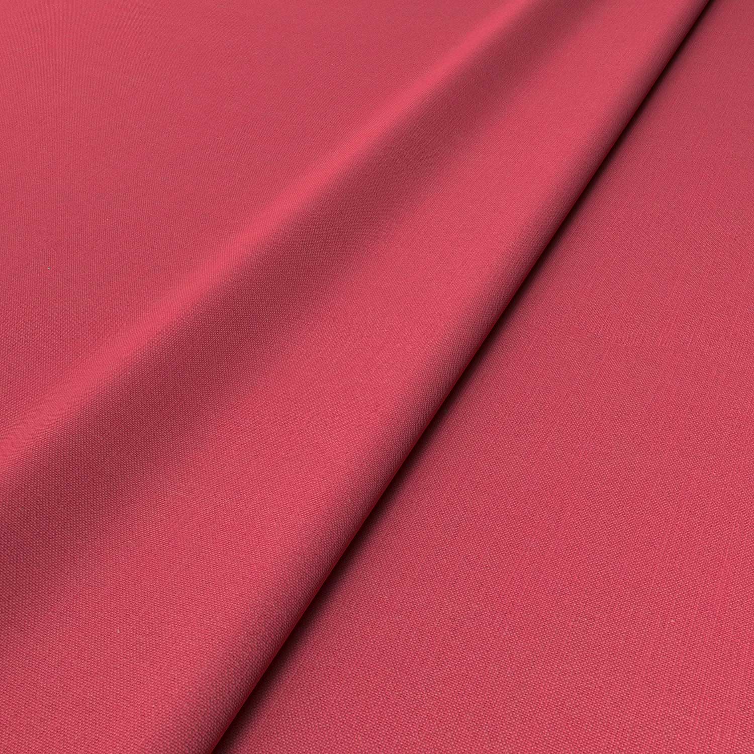 Sample of a pink woven fabric.