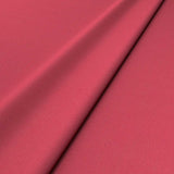 Sample of a pink woven fabric.