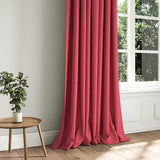 A pink stain resistant woven fabric on an armchair.