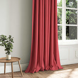 A red woven fabric shown as a curtain.
