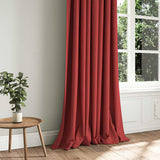 A red woven fabric shown as a curtain.