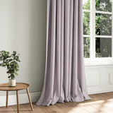 A purple woven fabric shown as a curtain.