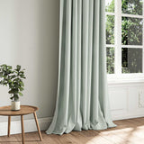 A blue woven fabric shown as a curtain.