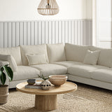 Sofa covered in a boucle fabric in Buttermilk