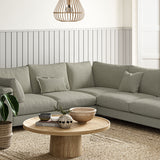 Sofa covered in a boucle fabric in Hemp