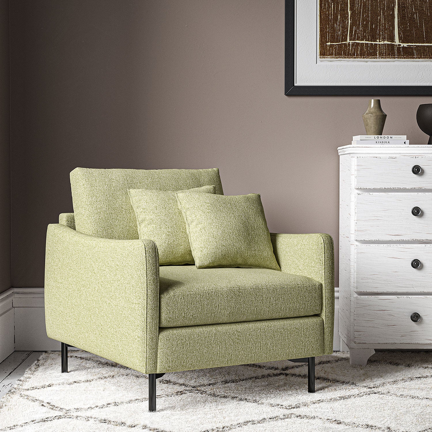 Chair covered in a boucle fabric in Peridot