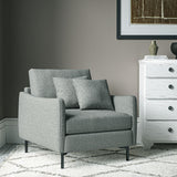 Chair covered in a boucle fabric in Blue Stone