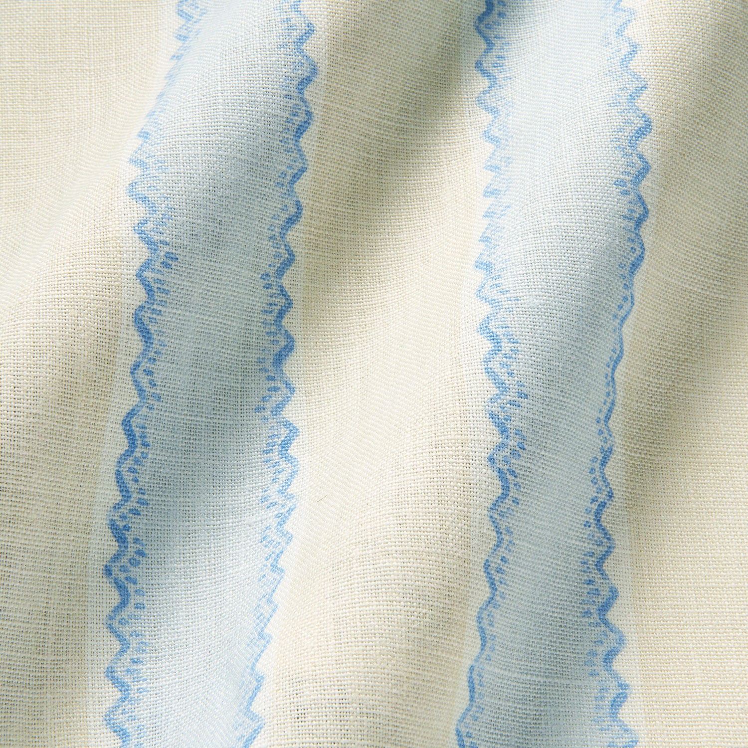 Printed linen fabric sample – a bold blocks of colour in this inviting stripe are softened with a painterly finish in blue, cream and white