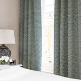 Linen curtains with a block print pattern in blue and cream