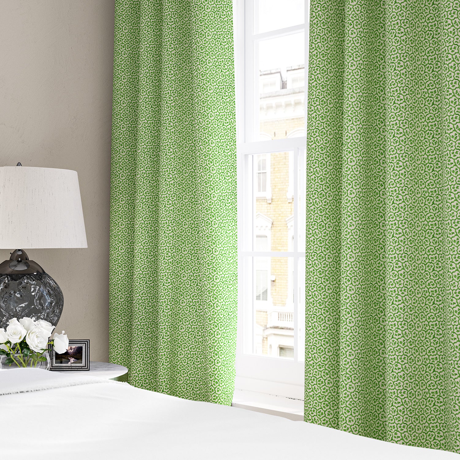 Linen curtains with a block print pattern in green and cream
