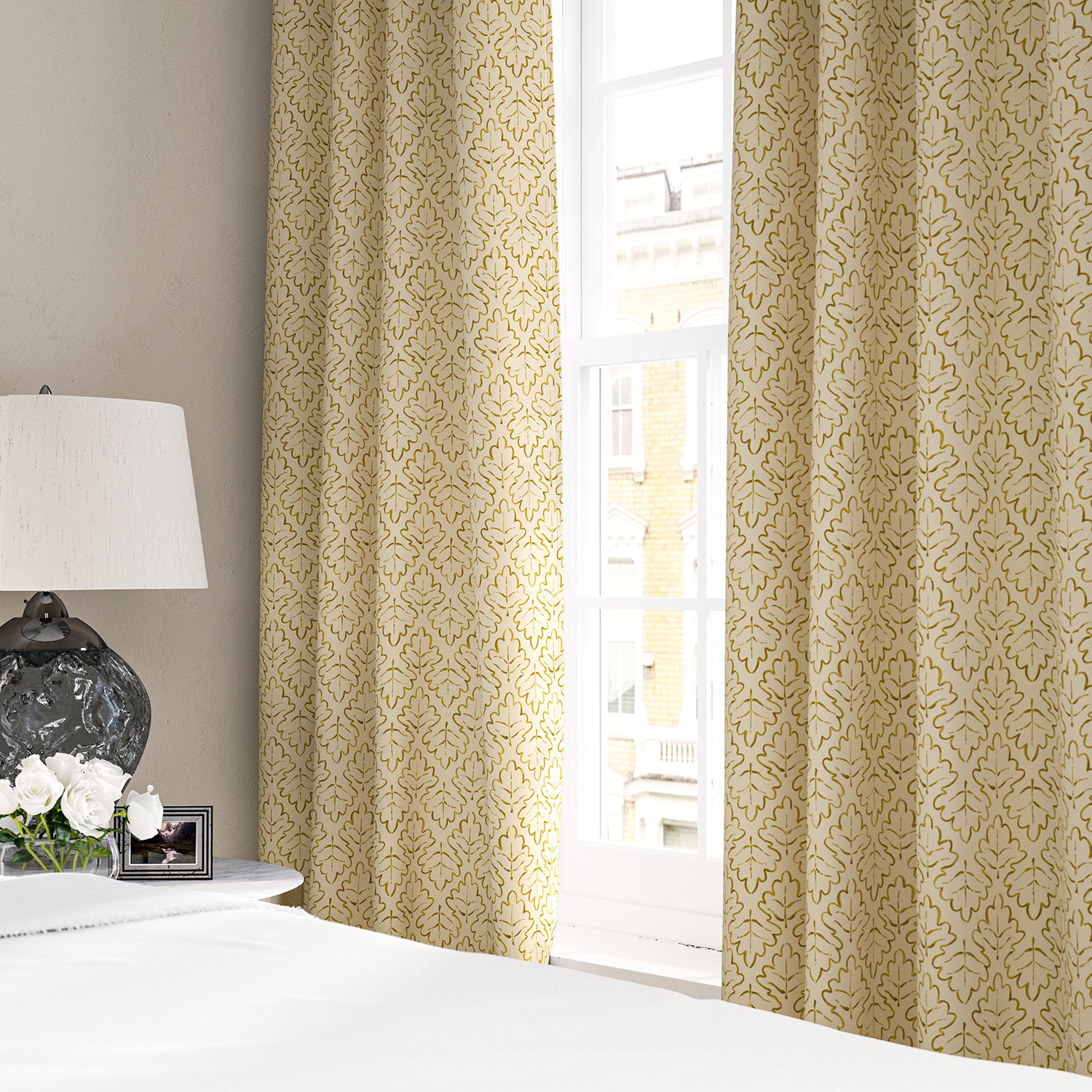 Linen curtains with a hand drawn; mirrored leaf motif pattern in yellow and cream
