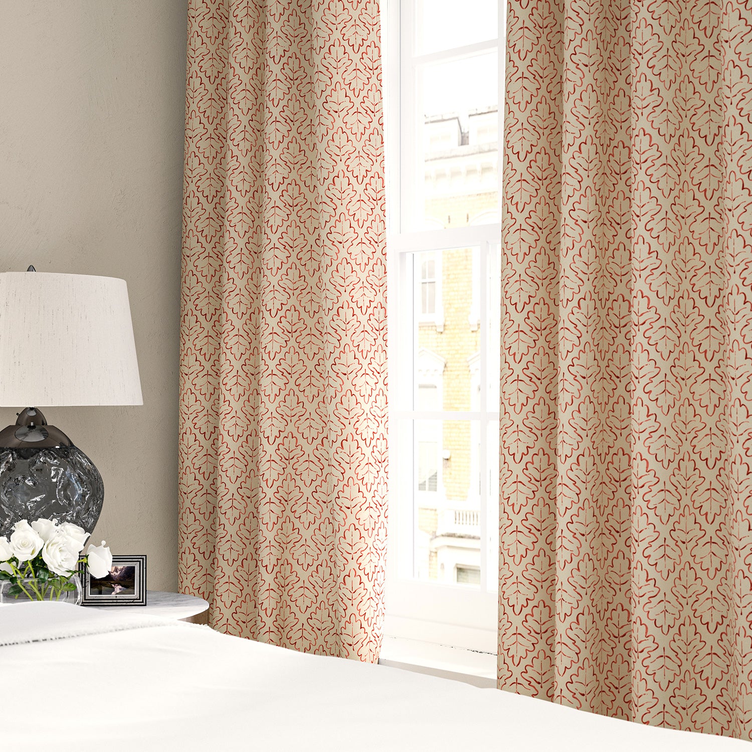 Linen curtains with a hand drawn; mirrored leaf motif pattern in red and cream