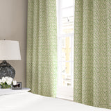 Linen curtains with a hand drawn; mirrored leaf motif pattern in green and cream