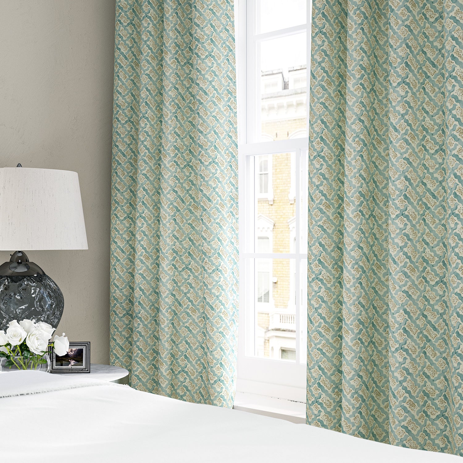Linen curtains with a contemporary lattice design in blue, cream and white 