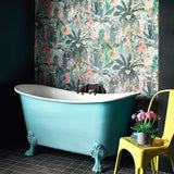 Tropical wallpaper in blue, shown in a bathroom.