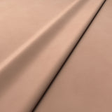 Fabric swatch of a pink velvet upholstery fabric